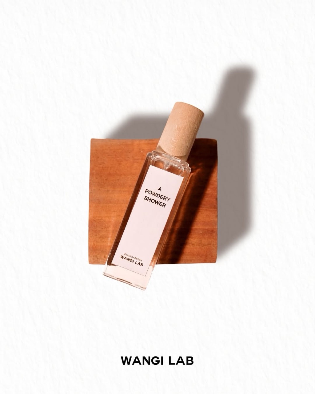 Perfume bottle with driftwood